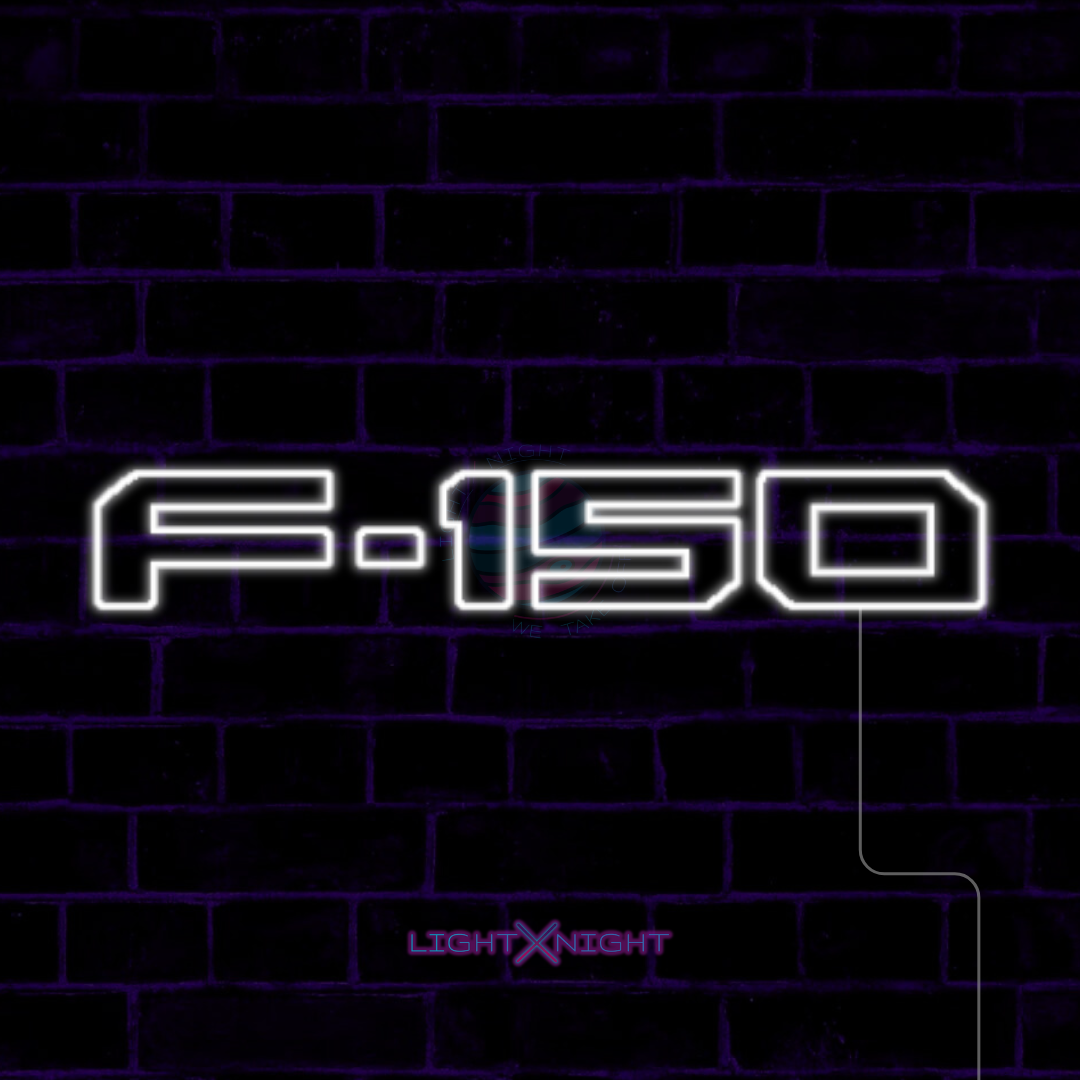 White Ford F-150 lettering LED neon sign displayed on a dark brick wall