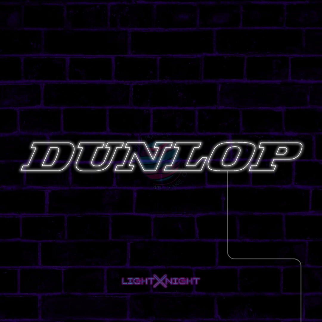 White Dunlop lettering LED neon sign displayed on a dark brick wall