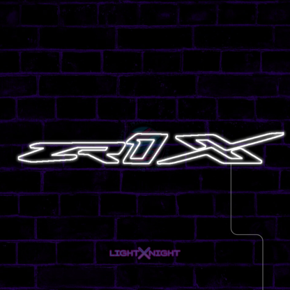 White Chevrolet Corvette ZR1X lettering LED neon sign displayed on a dark brick wall