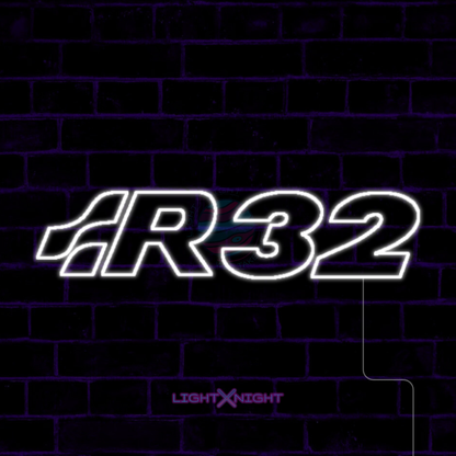 White Volkswagen R32 lettering LED neon sign displayed on a dark brick wall