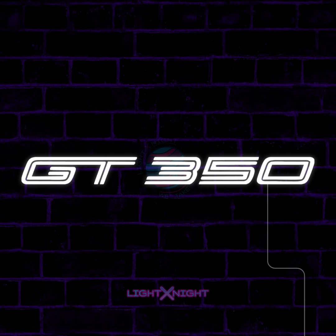 White Ford Mustang Shelby GT350 lettering LED neon sign displayed on a dark brick wall