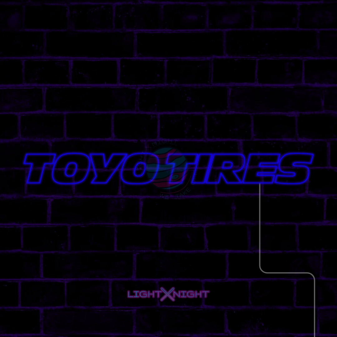 Blue Toyo Tires lettering LED neon sign displayed on a dark brick wall