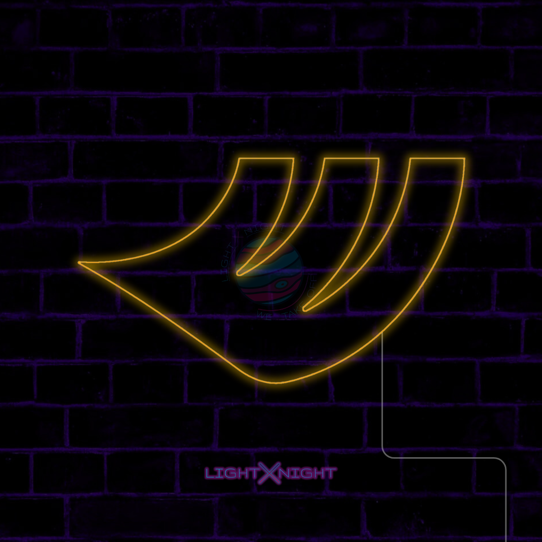 Yellow Hankook emblem LED neon sign displayed on a dark brick wall