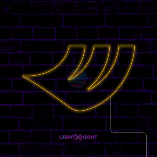 Yellow Hankook emblem LED neon sign displayed on a dark brick wall