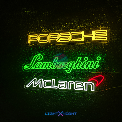 Neon signs of Porsche, Lamborghini, and McLaren 