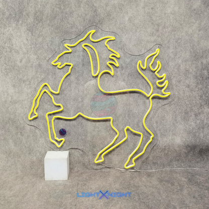 Yellow Stuttgart Horse Neon Sign displayed on a light gray wall